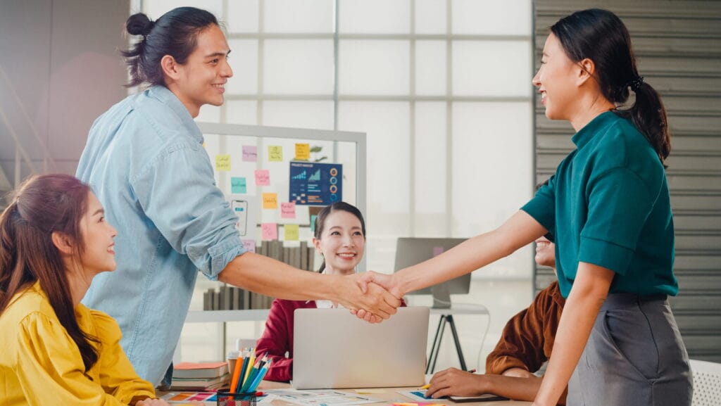 Brand Collaboration shaking hand scene