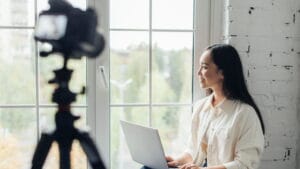 Patreon Malaysia Creators look to window and smile