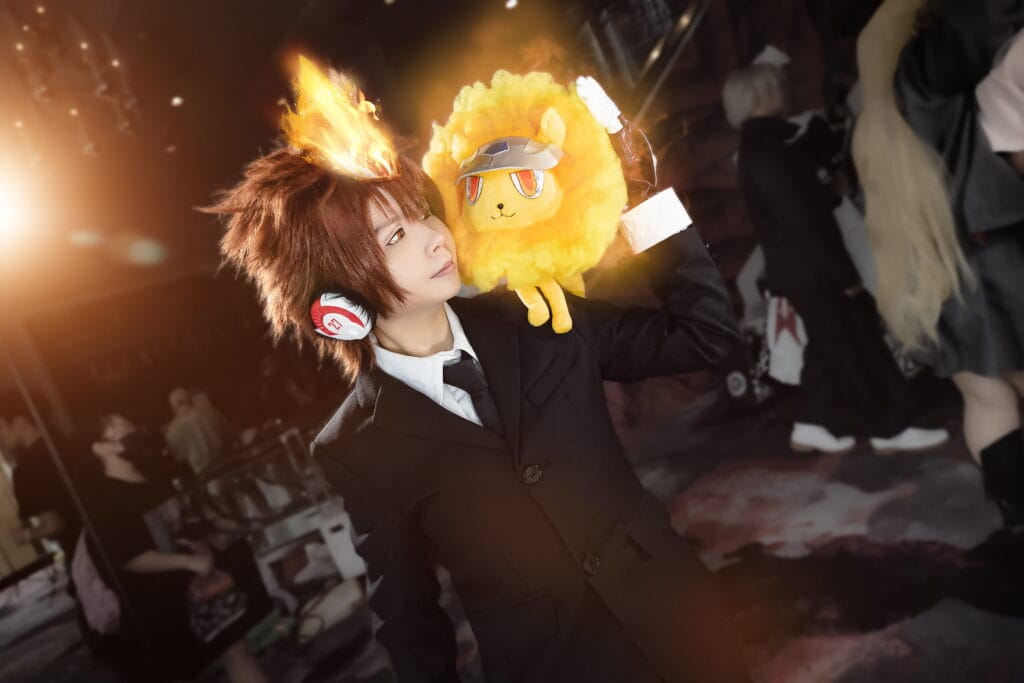 Fire-themed cosplay portrait with dramatic visual effects