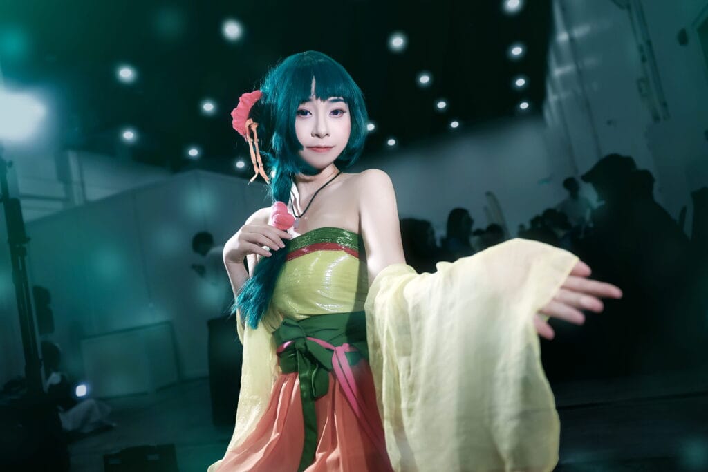 Green dress cosplay portrait with soft fantasy atmosphere