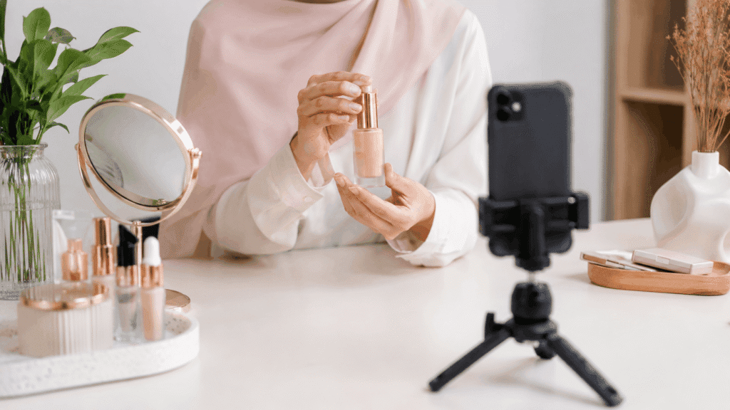 Faceless beauty product demo with a smartphone on tripod, showing how to create Shopee Affiliate Without Showing Your Face on camera
