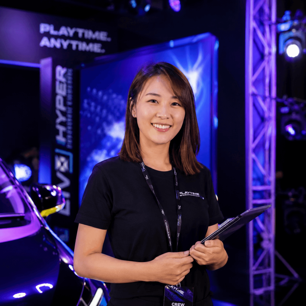 Photography Services Malaysia | Business, Product & Event 46 Malaysian Chinese event professional holding a tablet at a corporate campaign venue
