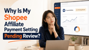 Malaysian Asian creator checking a Shopee Affiliate payment setting pending review status